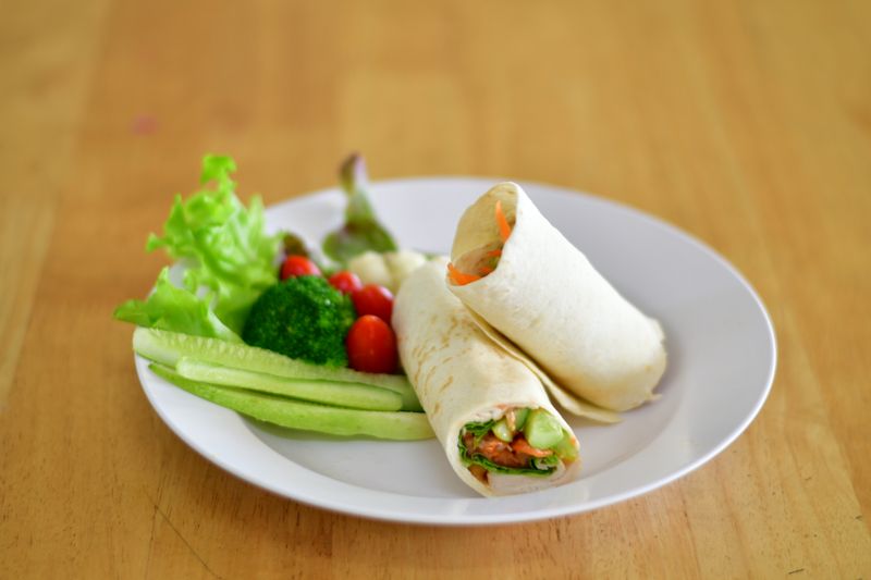 Garden Fresh Veggie Piada with roasted vegetables and hummus