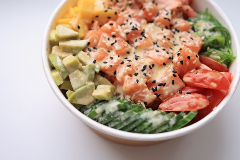 Tuscan Salmon Bowl with wild-caught salmon and roasted tomatoes